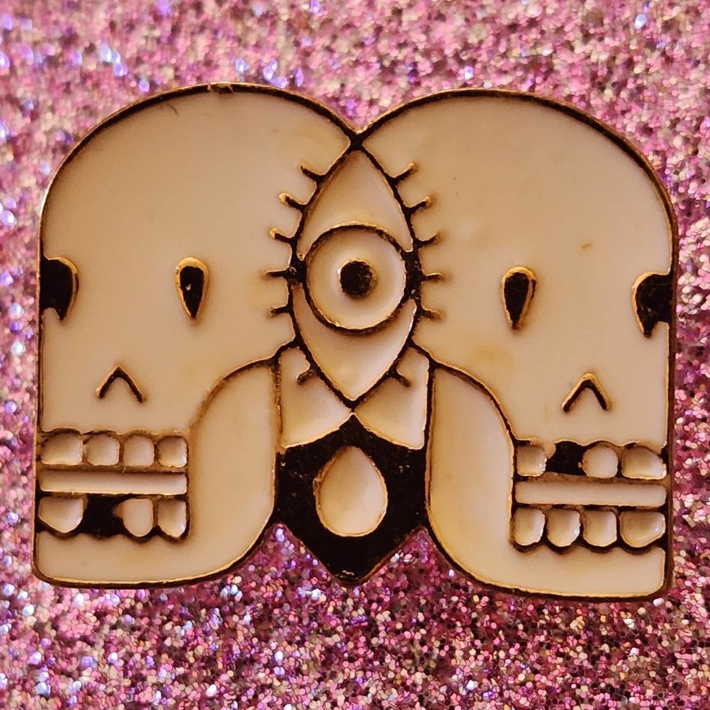 3/$20 Attatched Twin Skulls Mystic Symbols White & Gold Enamel Pin